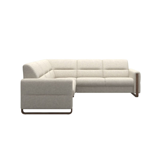 A light beige fabric corner sofa with teak wood accents and a contemporary design.