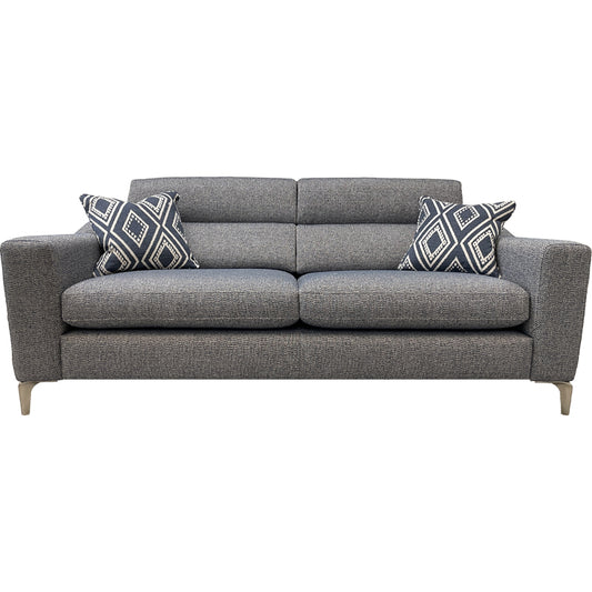 A gray 3 seater split sofa with two decorative cushions, featuring a fabric upholstery and wooden legs.