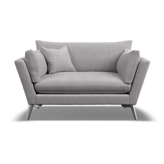 Gray sofa with cushions on a white background