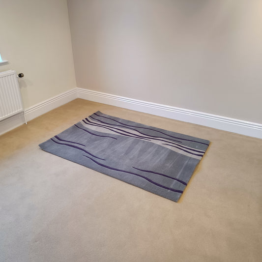 The Woven Edge Wave Rug