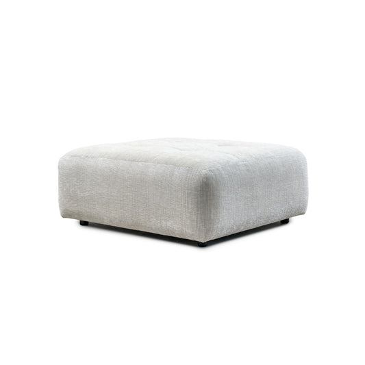 A gray fabric-covered footstool with a square shape and a flat top.