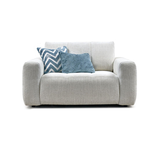 A beige Lucca Cuddler Swivel Chair with a blue and white striped cushion, isolated on a white background.