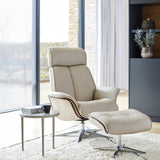 Beige recliner chair with ottoman in a modern living room setting