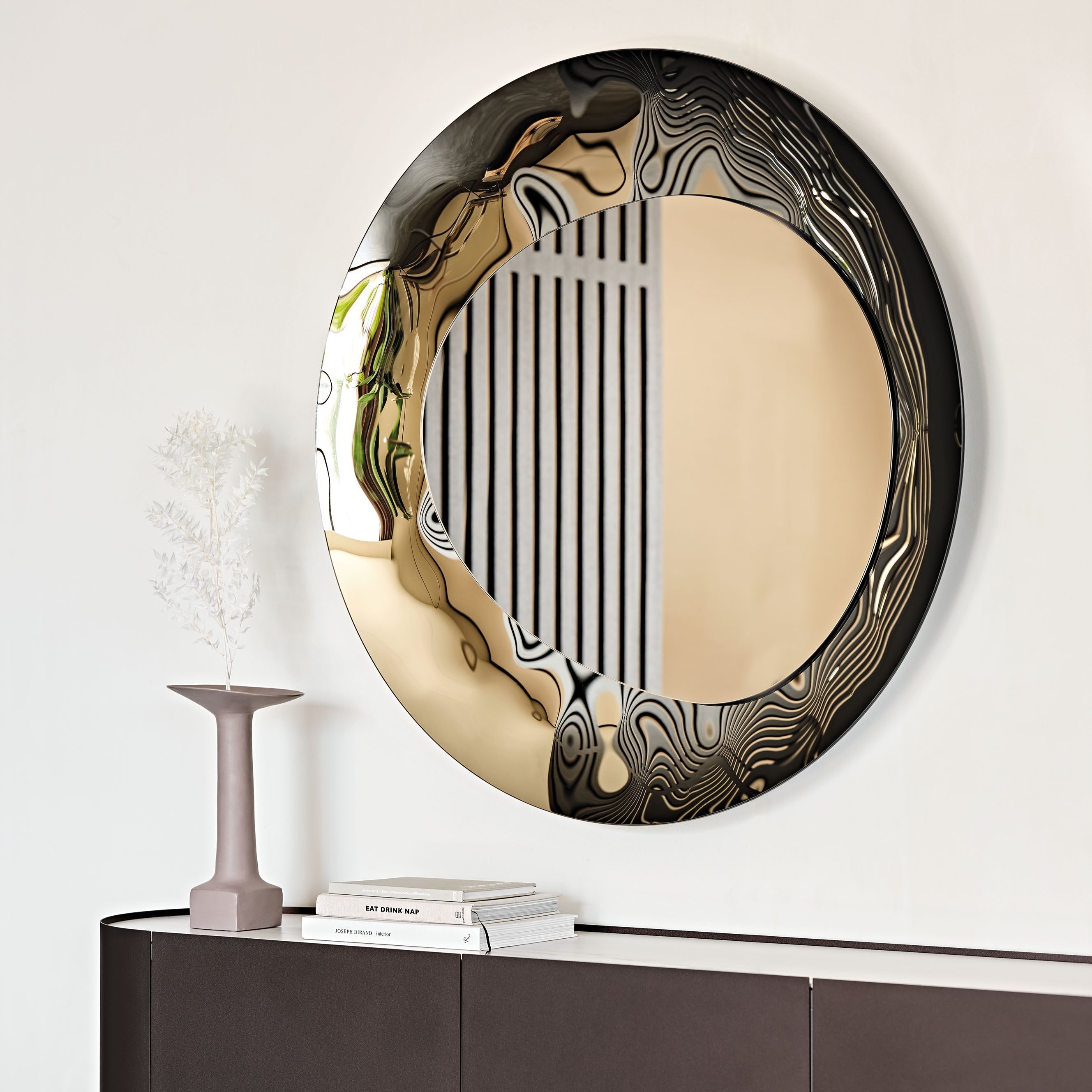An image of a bronze circular mirror 