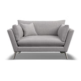 Gray sofa with cushions on a white background