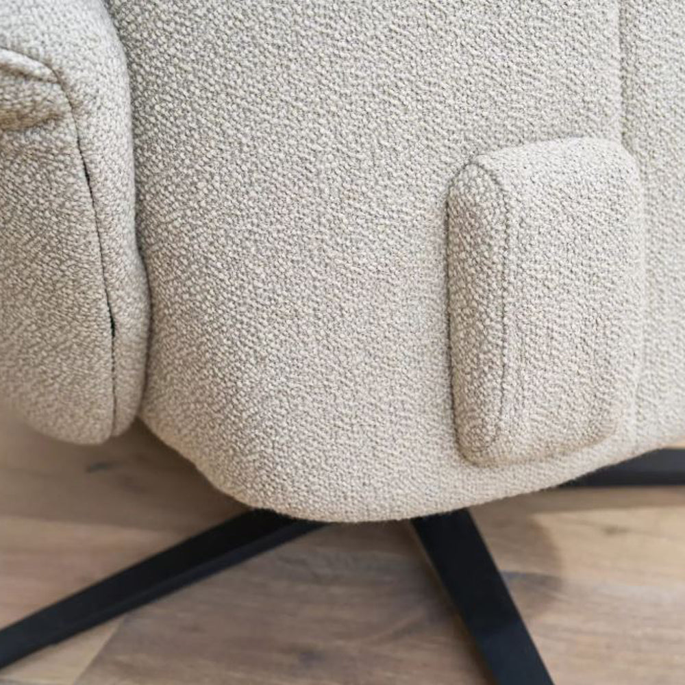 A detailed shot of the boucle fabric of the Himolla Recliner 
