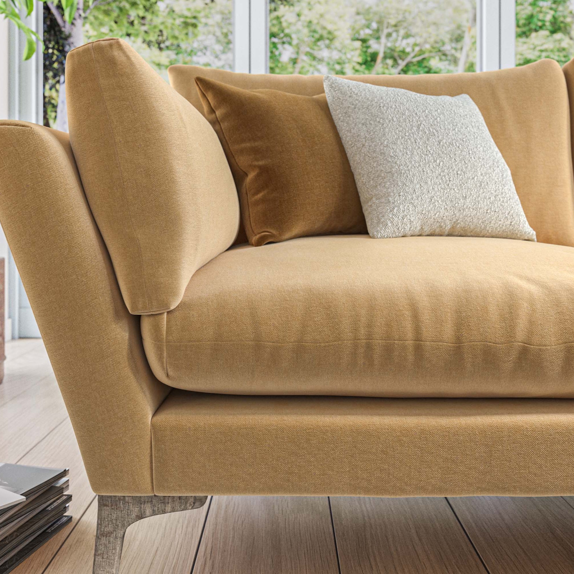 Brown sofa with cushions in a living room setting