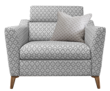 Patterned armchair with a pillow on a white background