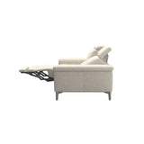 An image of the Stressless Anna Fabric Sofa on a side profile in a reclined position. 