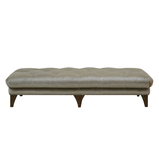 Alexander and James Luisa Footstool.. The image is a cut out on a white background. The footstool is shown in a Light Brown Leather with dark brown wooden feet. 