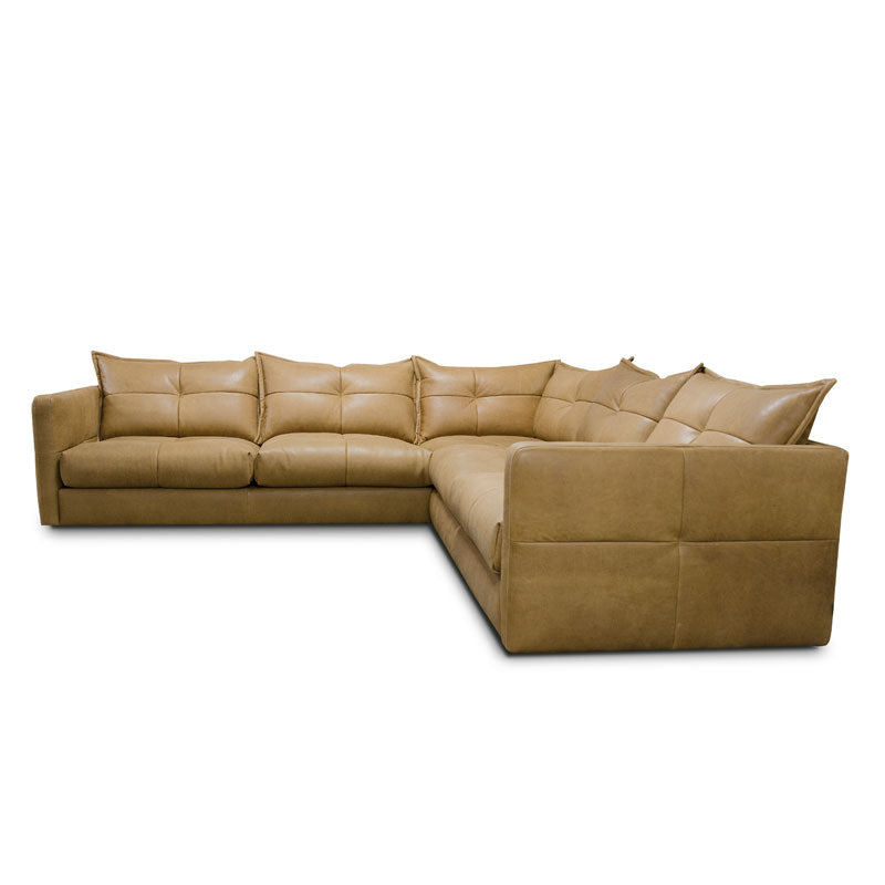 An image of the Alexander and James Tod Corner sofa shown in light brown leather. The image is the side profile of this product. 