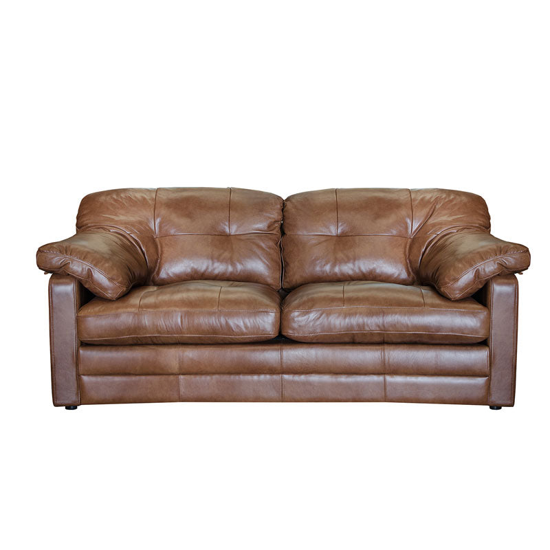 A cut out image of the Bailey Sofa. The sofa is brown leather with cushion leather arms. 