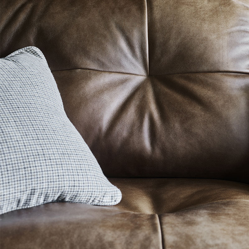 A close up image of the Alexander & James Bailey Sofa. The image is a close up of the back design of the sofa. 