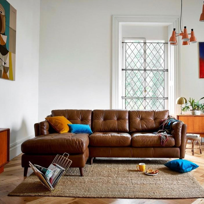 A lifestyle image of the Alexander & James Saddler Midi Sofa 