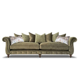 An image of the Alexander & James Utopia Sofa. The sofa is in a light green fabruc and has a pillow back. The sofa is on a cut out white background 