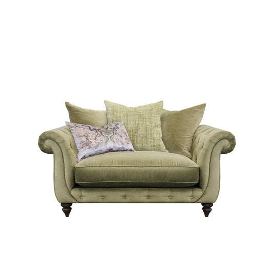 An image of the Alexander & James Utopia Pillow back Fabric snuggler. The snuggler is in a light green fabric and on a white background. 